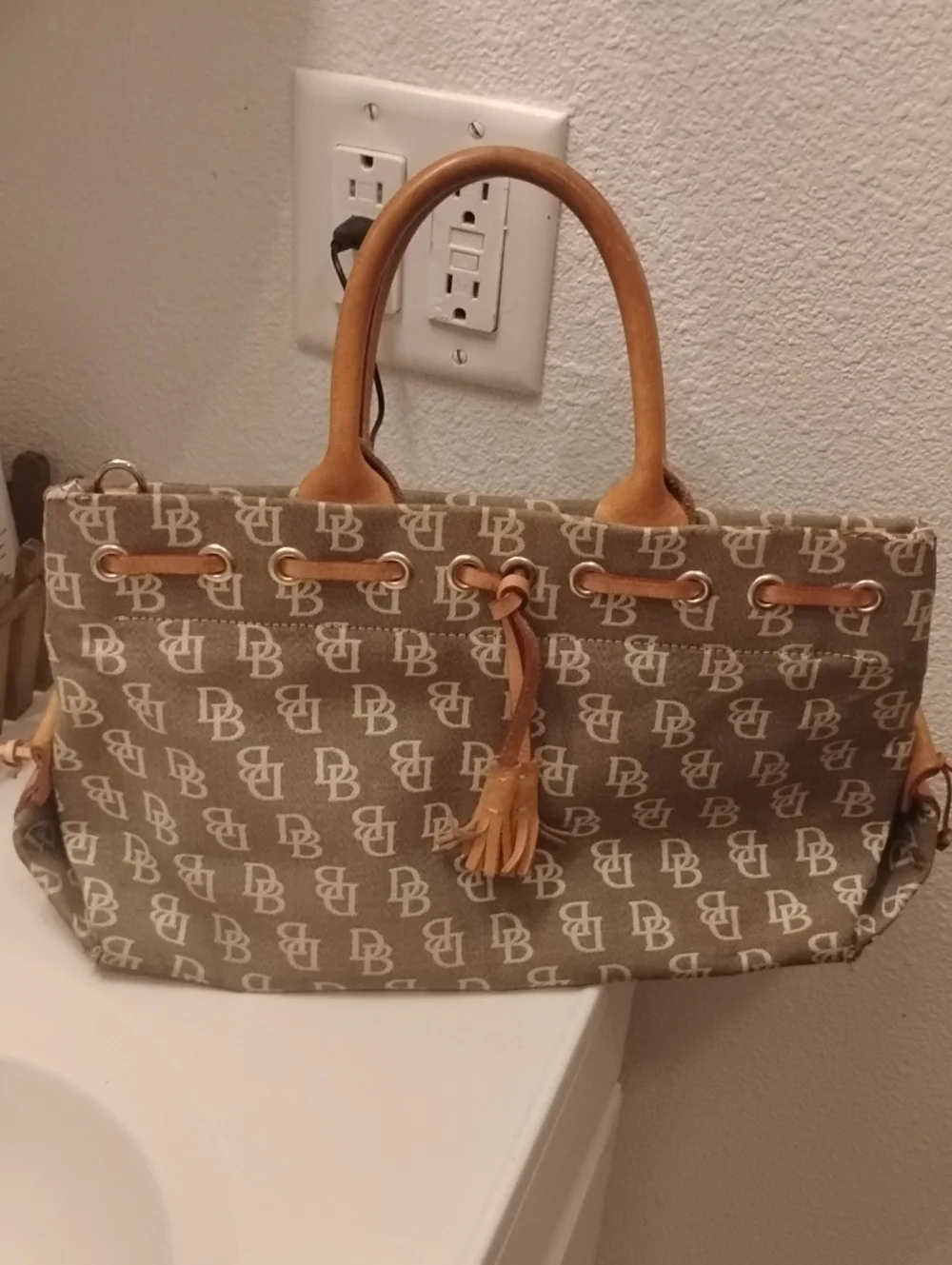 Dooney & Bourke Beige/Tan Signature Logo Tote with Tassel
